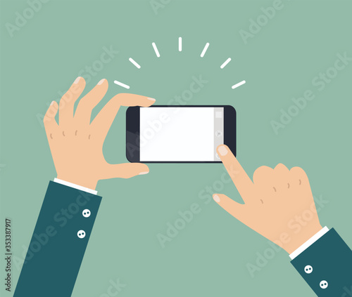 hands hold phone with touch take photo