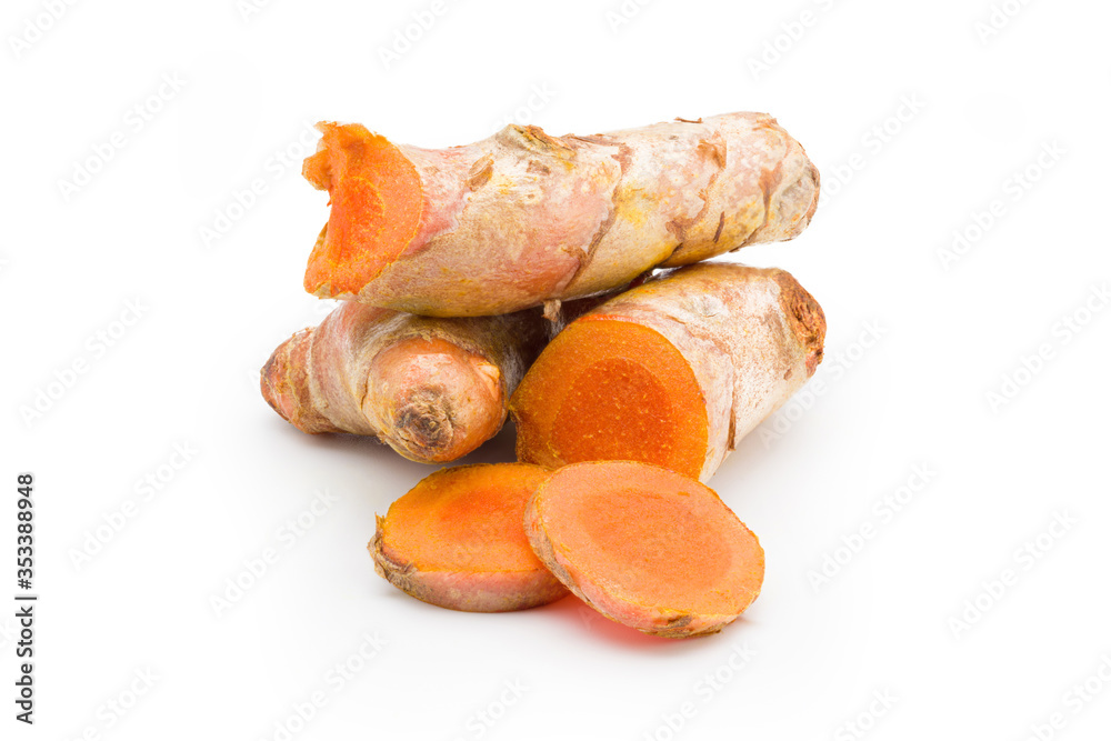 A pile of fresh turmeric on white. Clipping path. A pile of fresh turmeric on white. Clipping path.