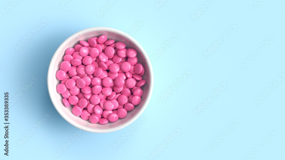 White bowl filled with pink coated chocolate candies on blue background. 3d rendering White bowl filled with pink coated chocolate candies on blue background. 3d rendering