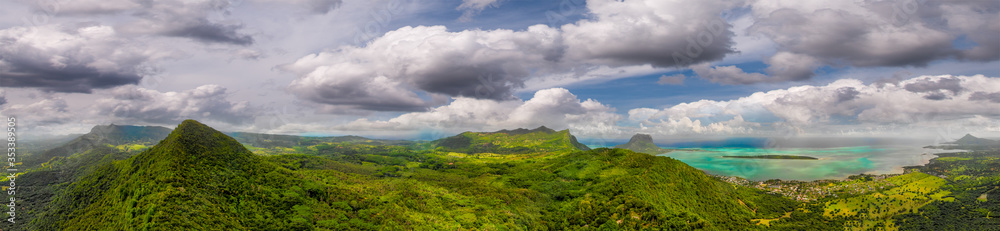 Aerial view of Le Morne Beach and Mauritius coastline on a sunny day Aerial view of Le Morne Beach and Mauritius coastline on a sunny day