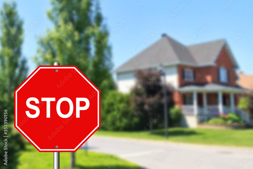 Stop sign at an intersection with a street Stop sign at an intersection with a street