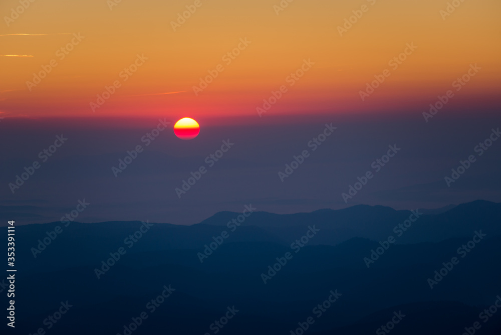 Beautiful sunrise over the mountains, long distance