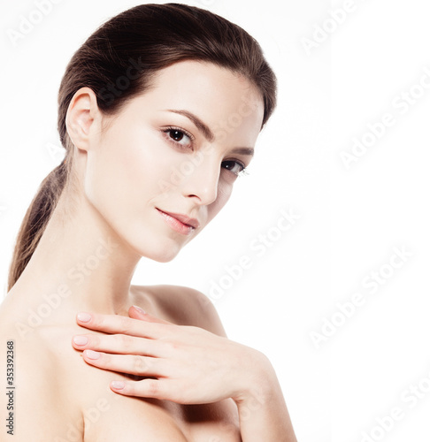 Young beautiful woman with hands portrait with healthy skin studio on white