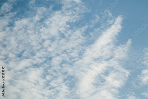 Spindrift beautiful white clouds. blue sky background photo