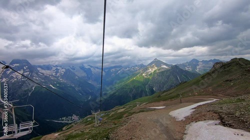 Green mountain in Dombai karachay-cherkessia Russia. Cableway, ropeway, cable way. Hd footage Dombai landscape. Summer in cherkessia mountain high peak. Green lush forest park.