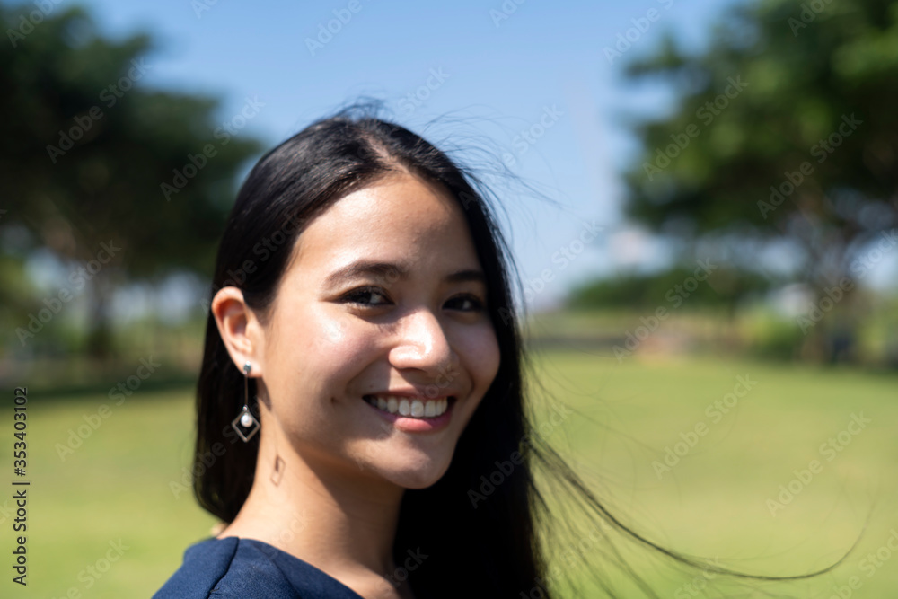 Smiling woman in windy day. Smiling woman in windy day.