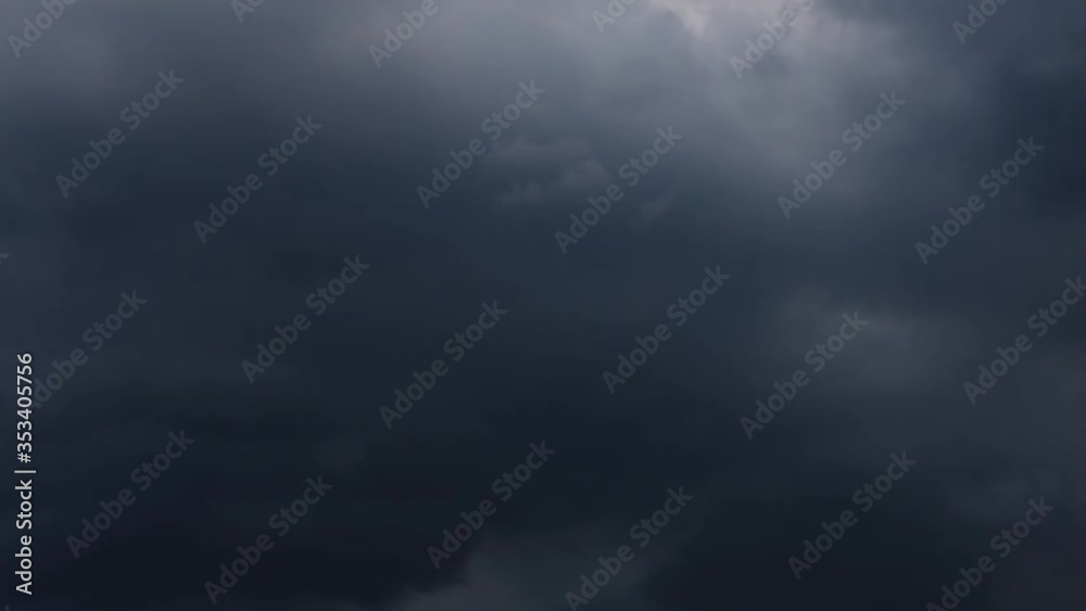 Time lapse motion the Black rain clouds are moving fast on the sky in the daytime. Time lapse motion the Black rain clouds are moving fast on the sky in the daytime.