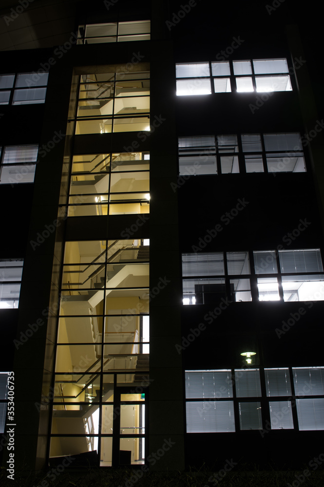 Staircase through window of an office at night