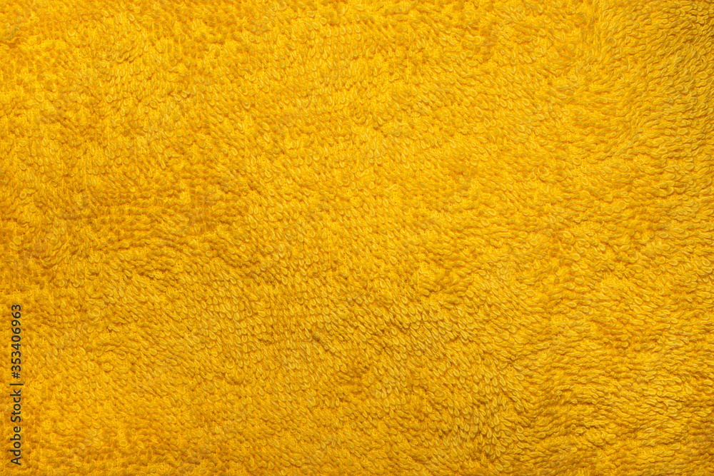 Yellow abstract fabric texture as background Yellow abstract fabric texture as background