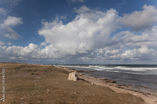 Seashore and clouds over the sea