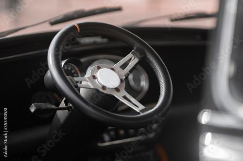 steering wheel of an old racing car © Roman