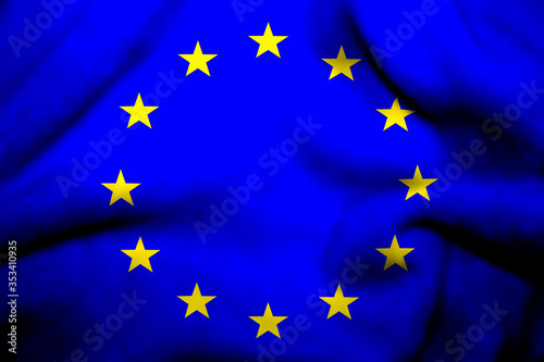 Flag of European Union on textile cloth background.