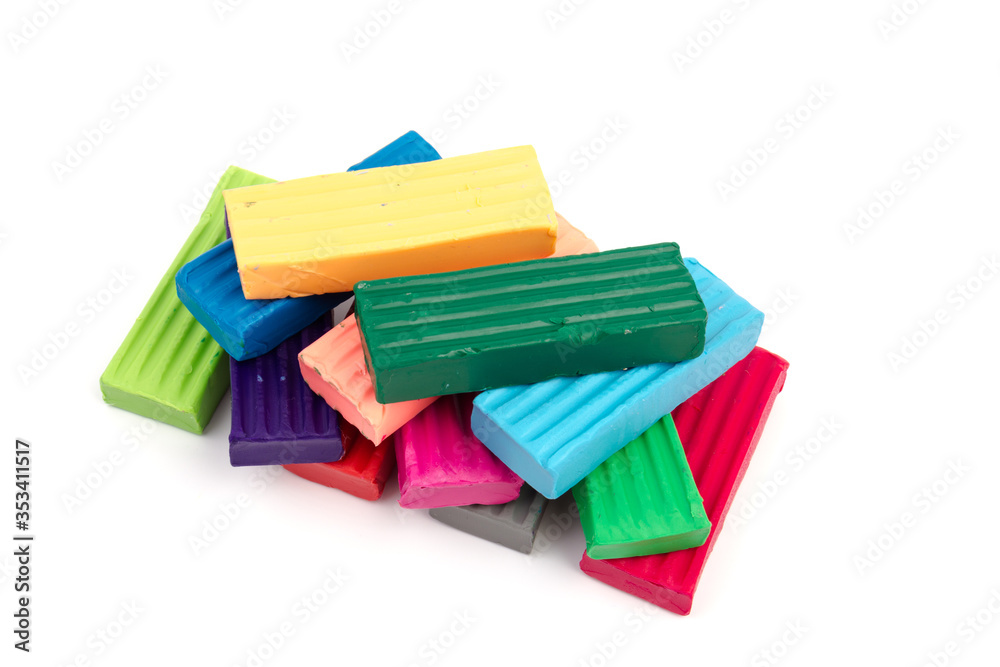 Сolorful plasticine isolated on white background. Space for text Сolorful plasticine isolated on white background. Space for text