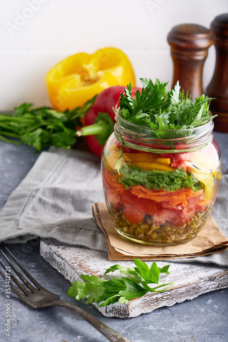 Tasty mason salad in jar. Homemade and healthy food