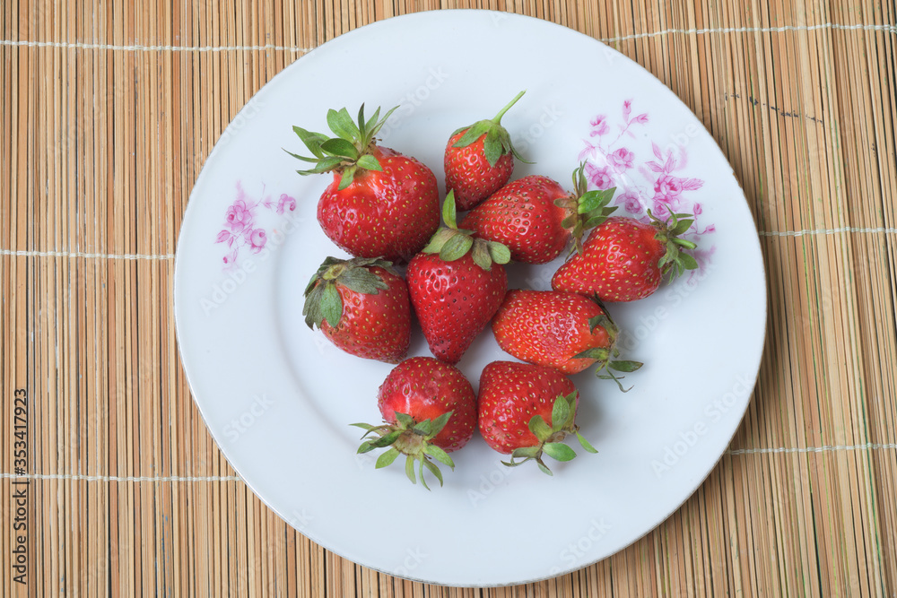 strawberries on a plate strawberries on a plate