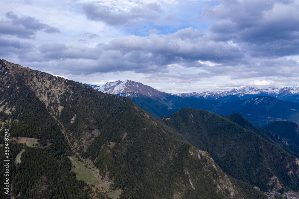 Aerial drone view of mountains in Andorra with snow on top Aerial drone view of mountains in Andorra with snow on top