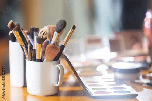 Blush brush and make-up tools on the table