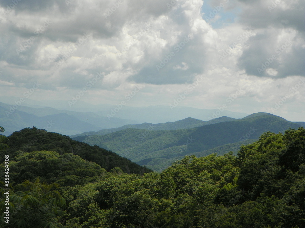 Obraz premium Mountains in the Clouds