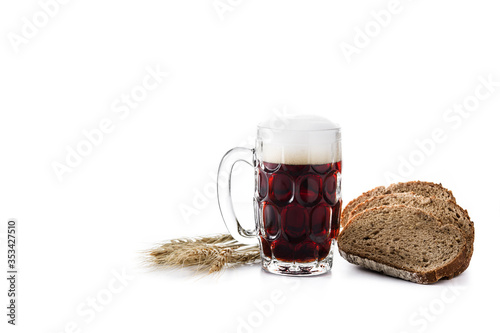 Traditional kvass beer mug with rye bread isolated on white background.Copy space photo