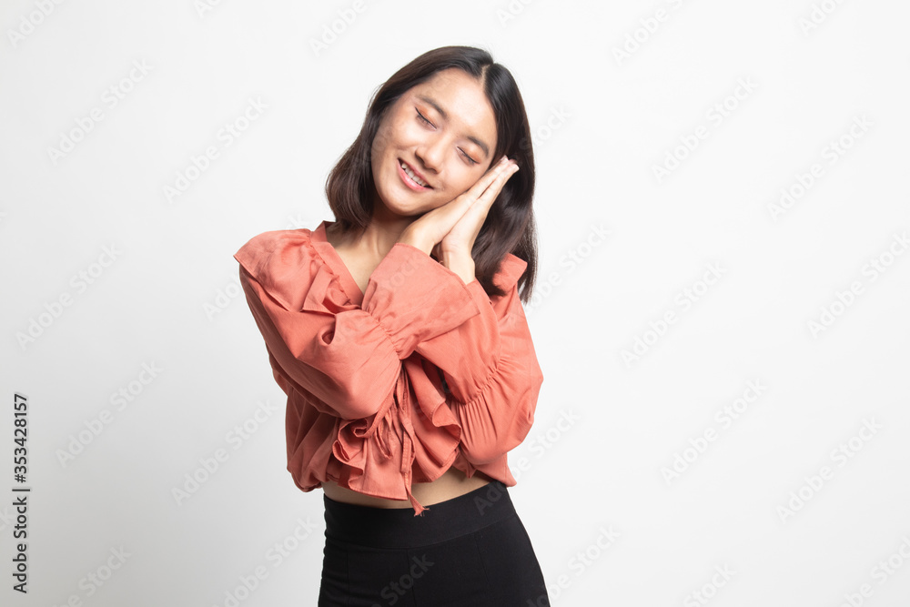 Beautiful young Asian woman with sleeping gesture . Beautiful young Asian woman with sleeping gesture .