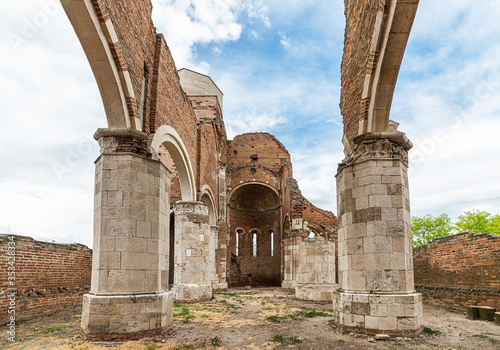 Novi Becej, Serbia - May 25, 2020: Arača (Hungarian: Aracs) is a medieval Romanesque church ruin located about 12 km of Novi Bečej, Serbia. It was built around 1230 during of the Kingdom of Hungary. photo