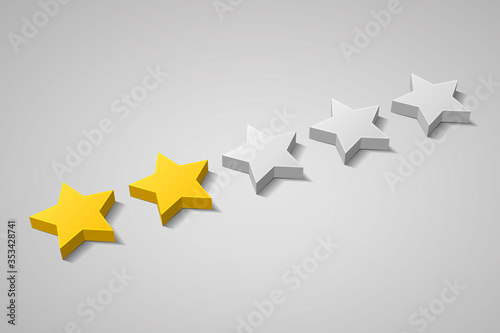 Two gold stars and three gray stars are over gray background
