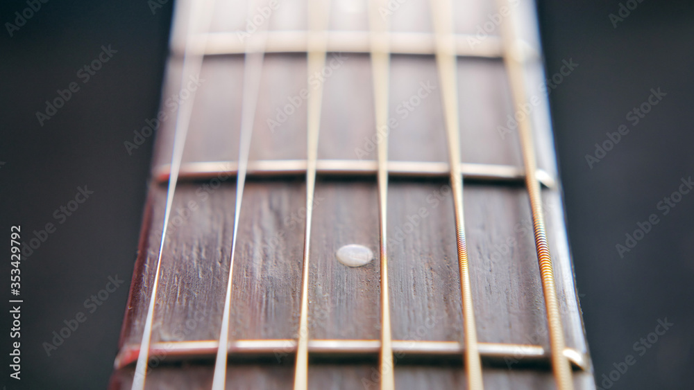 Closeup guitar neck with strings, high resolution