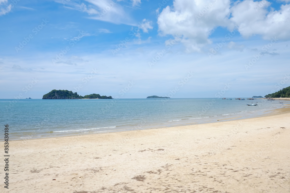View of seascape is sand beach and view island and blue sky at thailand