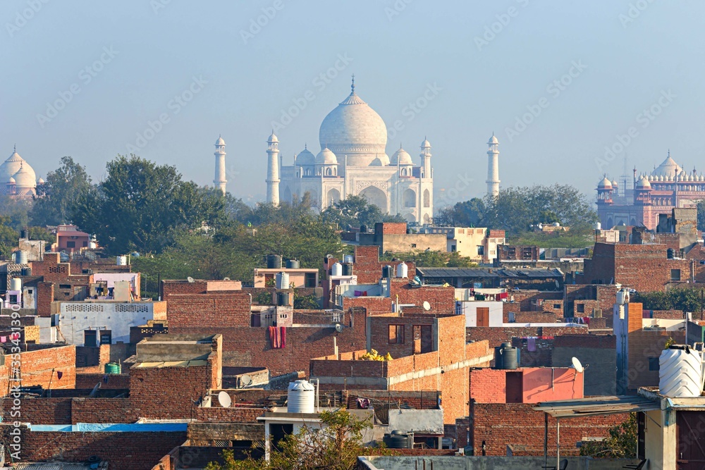Obraz premium Taj Mahal is a UNESCO World heritage site and one of 7th Wonder of the World.view from roof of Agra city, Uttar Pradesh, India