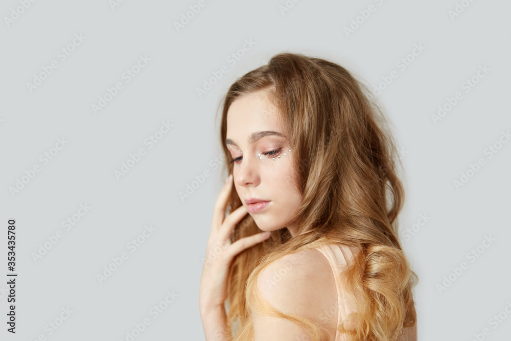 Beauty and hair care. Beautiful woman with magnificent blond hair. Beauty and hair care. Beautiful woman with magnificent blond hair.