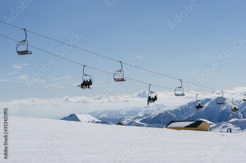 People climb the ski lift of Gudauri