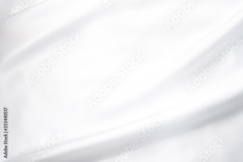 White abstract soft wave texture background template from cloth fabric natural texture template background.