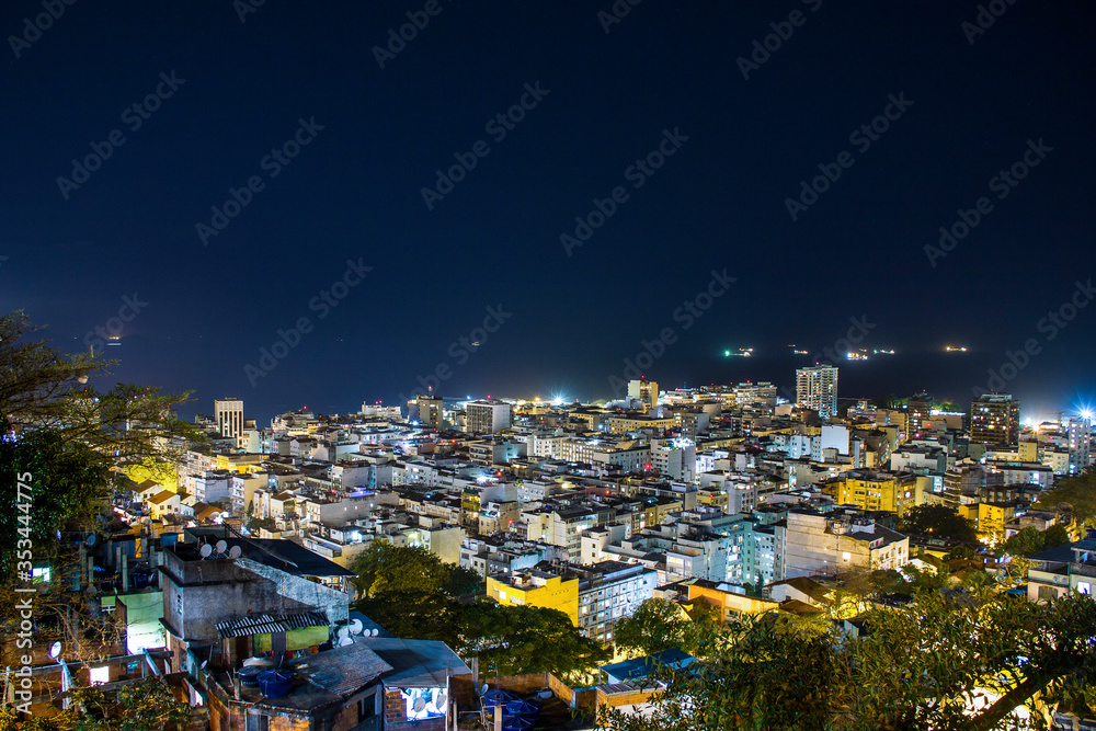 copacabana neighborhood at night seen from the top of the Cantagalo hill in Rio de Janeiro.