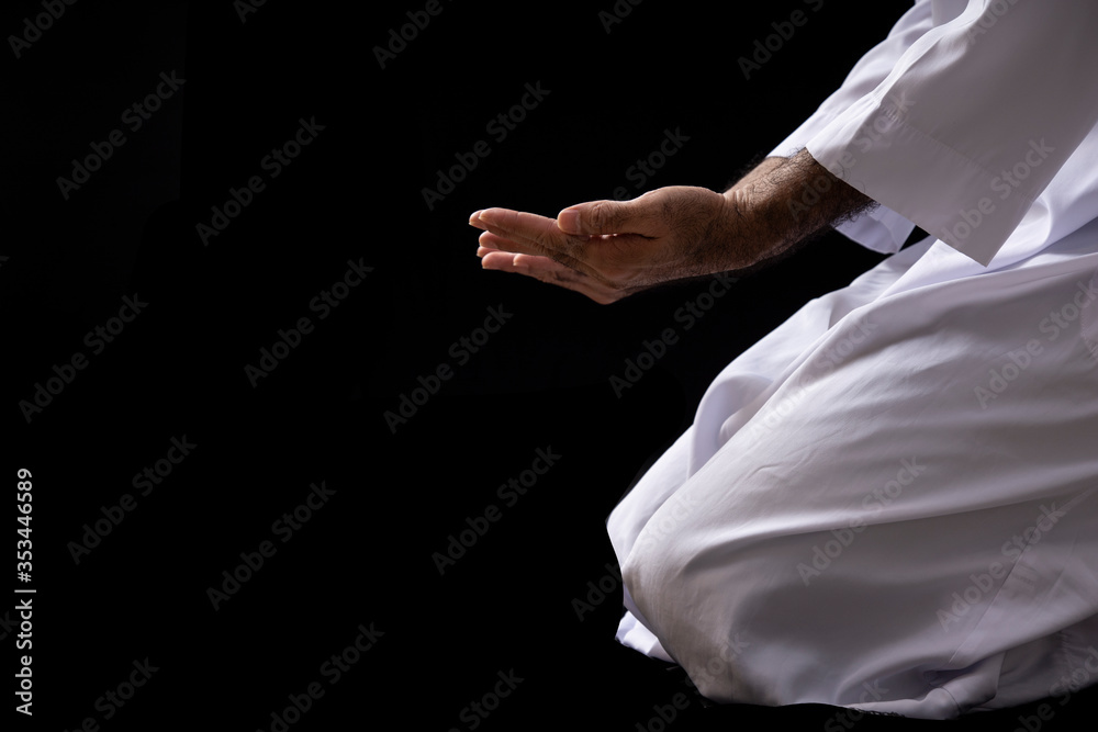 Religious Muslim man praying