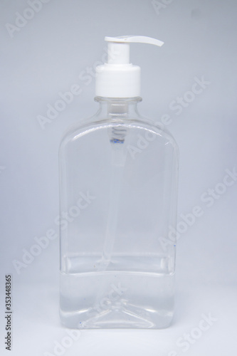 transparent jar of gel alcohol with white lid on a white background
