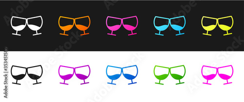 Set Glass of cognac or brandy icon isolated on black and white background. Vector Illustration.
