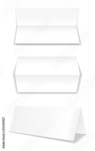 Realistic bifold paper brochures on white background with soft shadows. White booklet template. Business card design or flyer mock-up. Vector illustration.