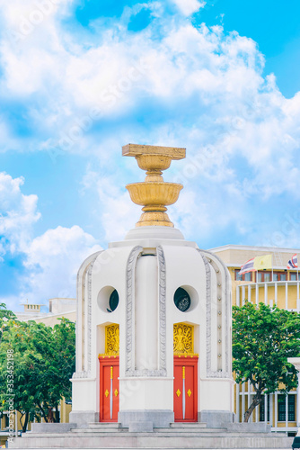 Democracy monument with blue sky in Bangkok, Thailand. The Democracy Monument is a historical of constitution monument