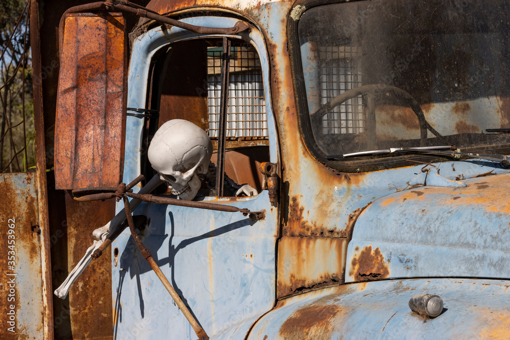 A Skeleton in a Rusty Truck