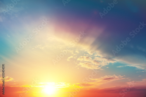 Colorful cloudy sky at sunset. Blazing sunset, gradient color. Sky texture, abstract nature background