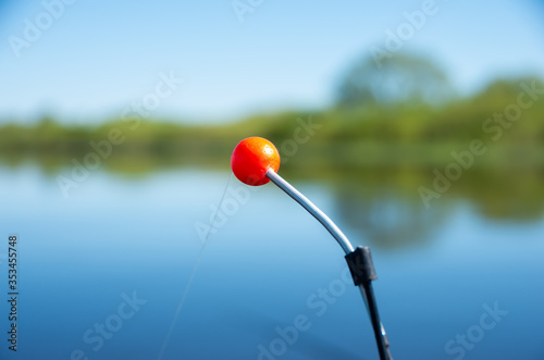 Orange float for fishing, sensitivity if the fish is catch © SummerDance