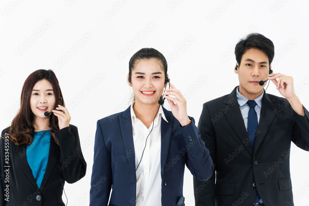 Young Asian business call center man and woman with headset ready to work for customer support. people smile with positive attitude. Consulting and assistance service concept background Young Asian business call center man and woman with headset ready to work for customer support. people smile with positive attitude. Consulting and assistance service concept background