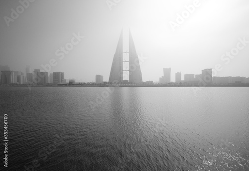 The Bahrain World Trade Center during a foggy day. The iconic building is the first skyscraper in the world to have wind turbines, December 29, 2017, Manama, Bahrain.