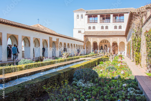 Granada, Spain - March 11, 2019: Gardens of Alhambra of Granada, Spain.