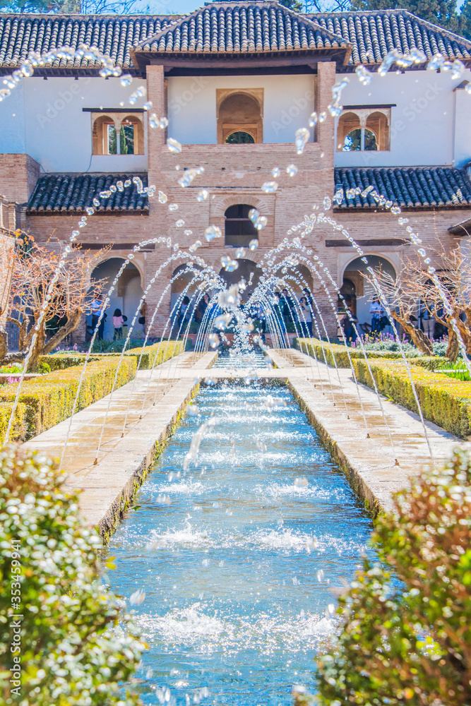 Fototapeta premium Granada, Spain - March 11, 2019: Gardens of Alhambra of Granada, Spain.