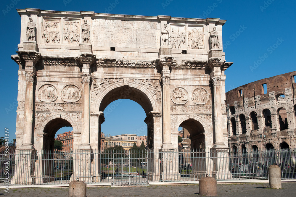 view of the arch of Constantine near the Colosseum in Rome Italy