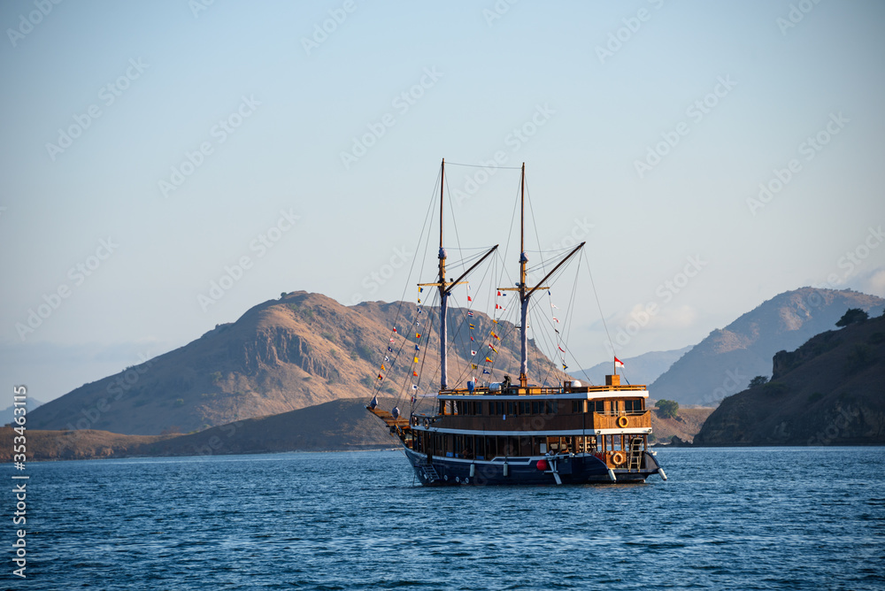 Boat anchored near Komodo Island in East Nusa Tenggara, Indonesia Boat anchored near Komodo Island in East Nusa Tenggara, Indonesia