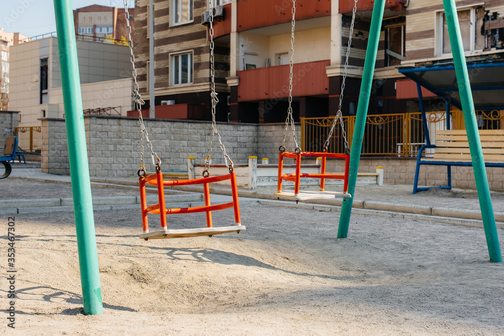 An empty children's Playground in Sunny weather during the pandemic. Stay at home An empty children's Playground in Sunny weather during the pandemic. Stay at home