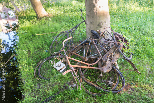 Old rusty bicycles that have been lifted from a ditch: a scene that you often see in Holland
