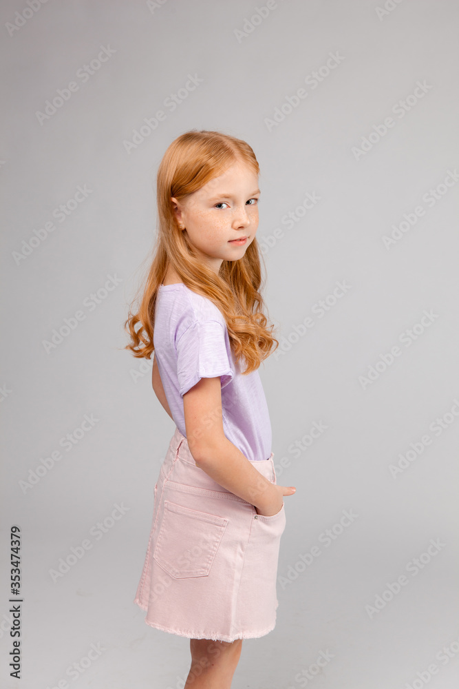 red-haired long-haired girl in daily clothes (skirt, t-shirt) red-haired long-haired girl in daily clothes (skirt, t-shirt)